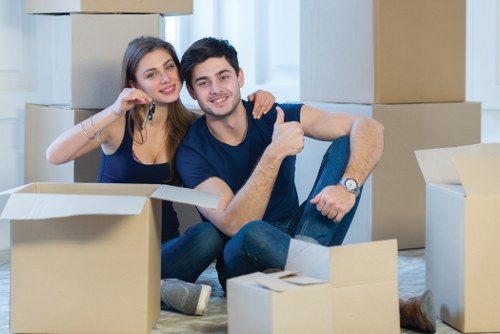 Removal team planning a home move in Edgware with boxes and furniture