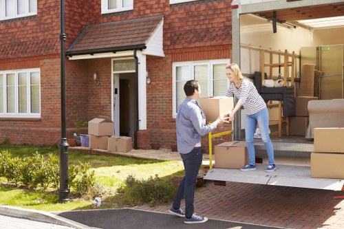 Loading furniture and boxes into a removal truck for an Edgware move