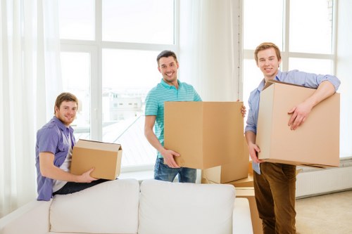 Fragile household items being carefully packed for relocation in Edgware