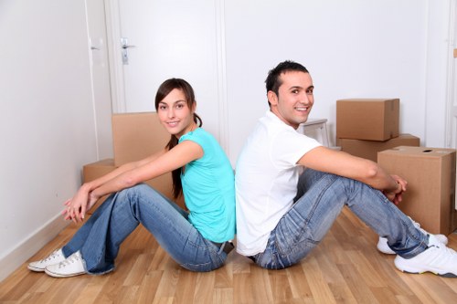 Unpacking boxes and organising a new home after moving in Edgware