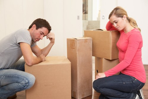 Careful handling of office furniture and boxed files during an Edgware move