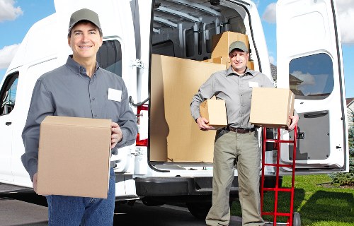Edgware moving truck loading furniture and boxes for transport