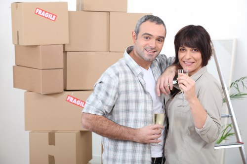 Removal van and packed boxes outside a residential property in Edgware